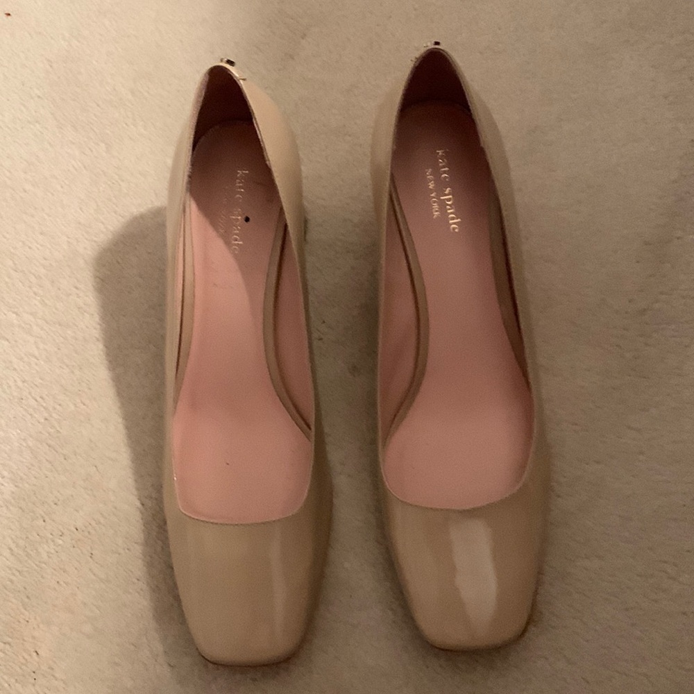 Great nude shade called powder kate spade pumps with block heel.